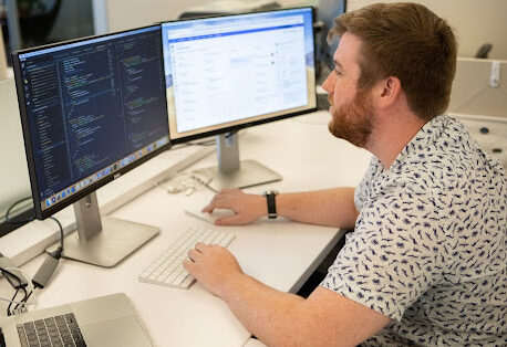 Web developer writing code