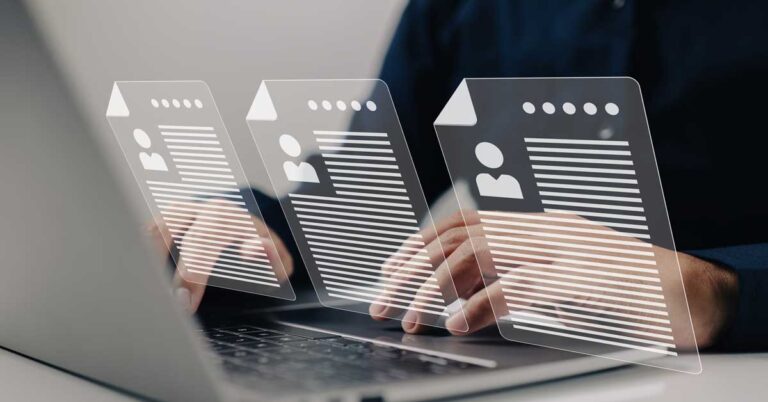 hiring manager looking at resumes