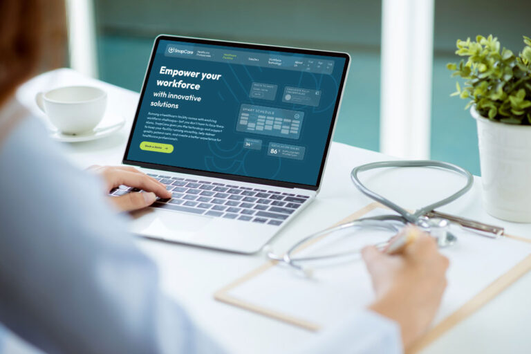 SnapCare page pulled on on laptop screen