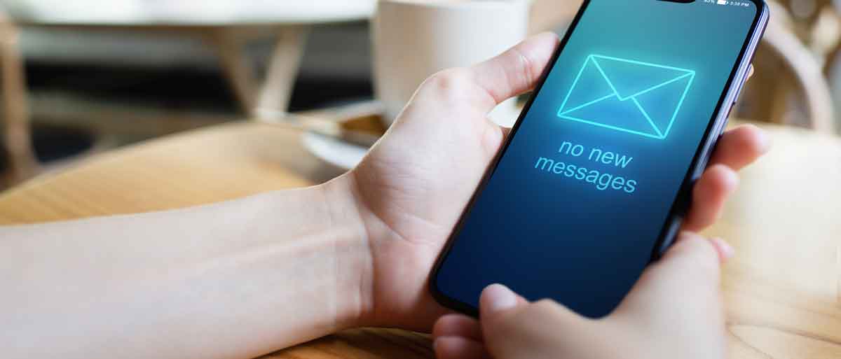 person with no new emails message on phone