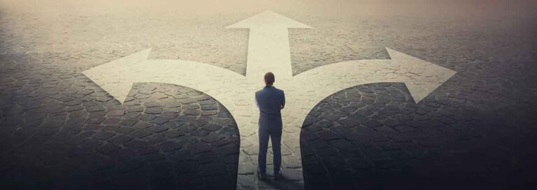 Business man choosing the right path to go down.