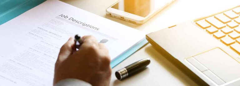 man reviewing job description got tech hiring strategy