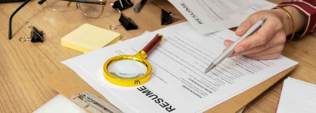 HR Manager reviewing resumes