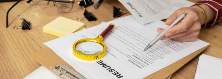 HR Manager reviewing resumes