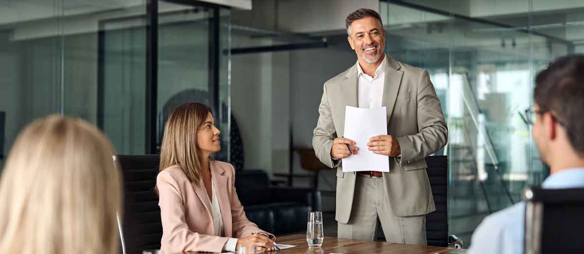 CEO working with team